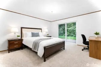 2nd bedroom with sliding glass door access to backyard.