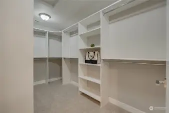 The centerpiece of the suite is the massive  walk-in closet, offering ample space to  organize and display your wardrobe and  accessories.
