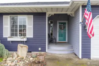 Front entry with rock water feature.