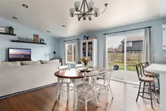 Dining room with sliding glass door to the back deck.