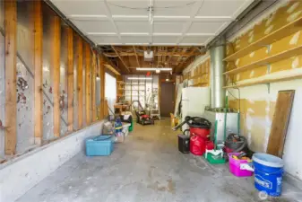 deep one car garage with room for one vehicle and shop space