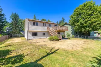 Backyard showing large space for RV, boat, extra vehicle, all closed in by fence