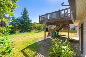 shaded patio below large porch for enjoying your yard on those hotter days