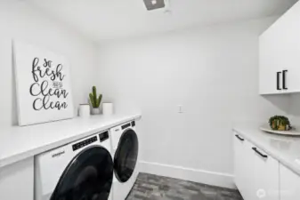Here's the other laundry room; lots of cabinetry; and you won't mind folding clothes here. Undercounter w/d.