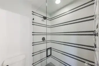 Upstairs adj shower space; statements made in black and white.