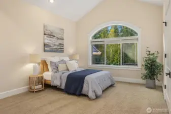 2nd Secondary bedroom with vaulted ceilings and large closet