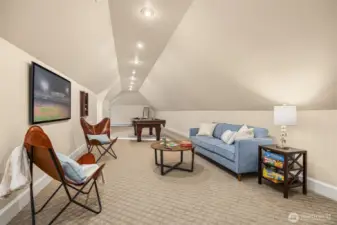 Large flex room above the garage.  Would make a great Media room or ??