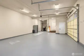 High Efficiency Hydronic floor heating system in the far back corner.  Large 3 car garage with ample room for additional shop space.