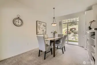 Dining room off kitchen with patio