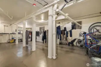Another photo of the laundry room, which also includes drying space and bike parking.