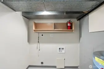 Looking at other end of mechanical room on lower level. Washer and Dryer ready for any style you prefer.