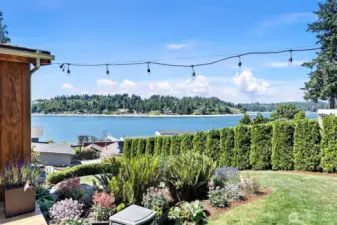 One doesn't be just on the front of the home to enjoy the out doors and spectacular views. If gardening is your hobby - do it with a view!
