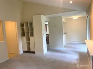 Open concept living space with southern-facing windows.