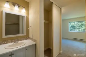Lighted vanity with lots of under-counter storage.