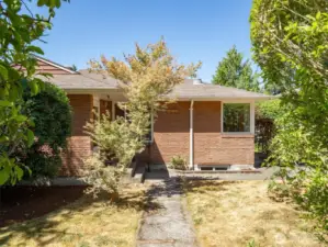 The front yard is nicely landscaped and easy to maintain.