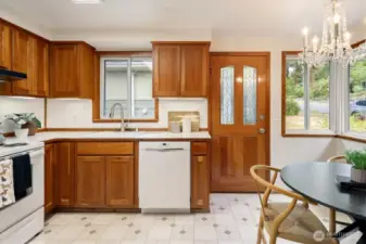 The kitchen gets nice natural light and allows for access to the side yard and the backyard.