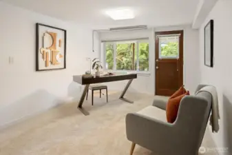 The lower level offers versatility right away with this bonus office space, craft room or TV / rec room, complete with backyard access.