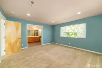 A spacious main primary suite is located on the second floor