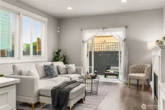 Living room with high ceilings and large oversized windows