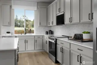 Photo is of a model home at Olympic Springs, KB Home; options and colors may vary based on selections and may include options and features that are not reflected in the list price. Depictions of home, layout, location or other features/options, colors and color scheme, materials, fixtures, etc. are for showing purposes only and may not be included in the purchase price and availability may vary.