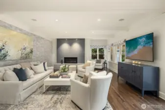 The main level boasts formal living and dining rooms made for hosting.