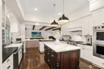 A stunning chef’s kitchen with breakfast nook.