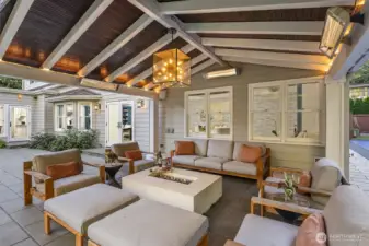 A charming, heated covered patio perfect for year-round entertaining.