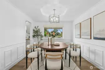 Beautiful dining room with recently updated light fixtures.