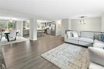 Spacious living room, open concept floorplan and abundant natural light