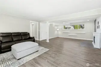 Versatile lower level ideal for media room, home office or guests.