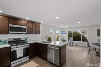 Gorgeous Kitchen is open to Dining and Living Rooms. Elegance, Efficiency and Effortless!