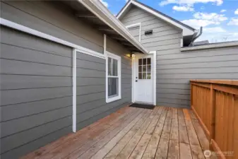 Deck off the Family Room leads to the backyard.