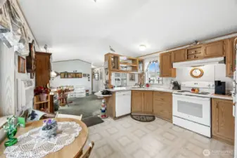 Open concept kitchen is functional & bright.
