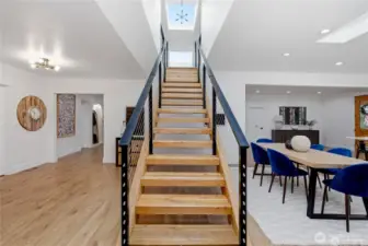 Stunning pine floating staircase with custom modern metal railings