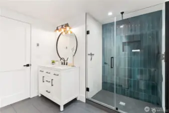 Three quarter bath on main floor with varient heated flooring! Stunning finishes and tile shower surround!