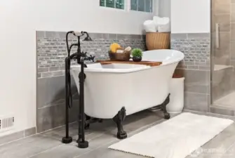 Gorgeous clawfoot tub perfect for relaxation on second level primary bathroom ensuite!