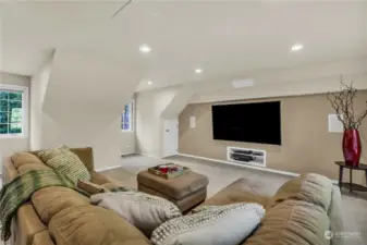 The bonus recreation room is built over the garage and features light cancelling blinds for anytime movie enjoyment and offers great space for chilling out.