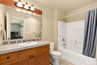 Full bath attached to 4th bedroom provides an additonal ensuite.