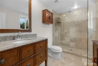 Upper primary bath with tile shower