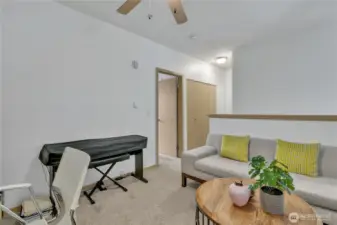 Loft - looking towards the primary suite and large hall closet.