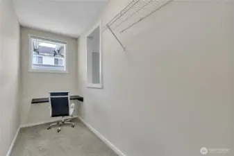 Office space on the second floor with built-in desk.