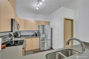 Quartz countertops throughout the kitchen, giving a sleek and clean look.