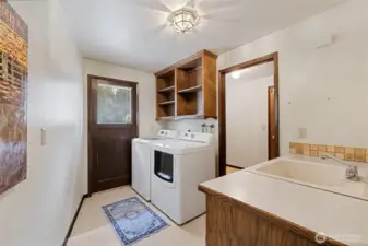 Laundry room/mud room with door to exterior