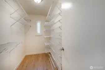 Walk-in closet just outside the waterside guest room.