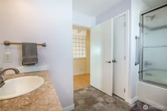 The full bath in between guest rooms on the main floor. Handicap bars in place.