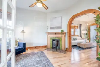 Look at that fireplace with original tile. It is a decorative feature, not a working fireplace, but a lovely focal point in the parlor.