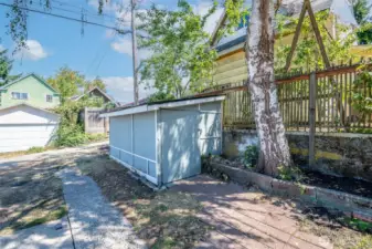 The owner parked a motorcycle in this shed, very convenient to use or have as storage space for your yard equiptment.