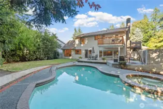 From pool parties to peaceful evenings in the hot tub, this fully fenced backyard is ready for year-round fun and relaxation
