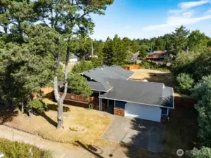 3 bedroom, 2 full baths close to the beach and on almost a half acre.