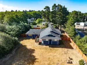Partially fenced with 6 foot cedar fencing. Double gate on NW corner for easy access.
